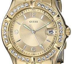Montre-bracelet GUESS dorée avec fonction de date.